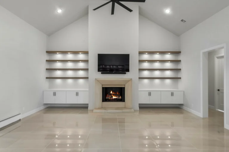 Large entertainment center in a fully white painted house 1