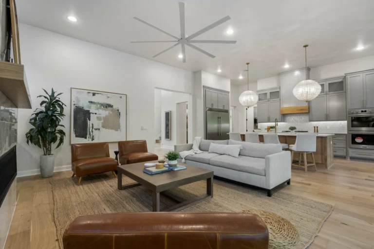 Living room fully furnished with white painted walls 1