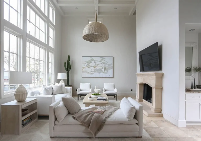 Residential living room with all white furning and white painted walls 1